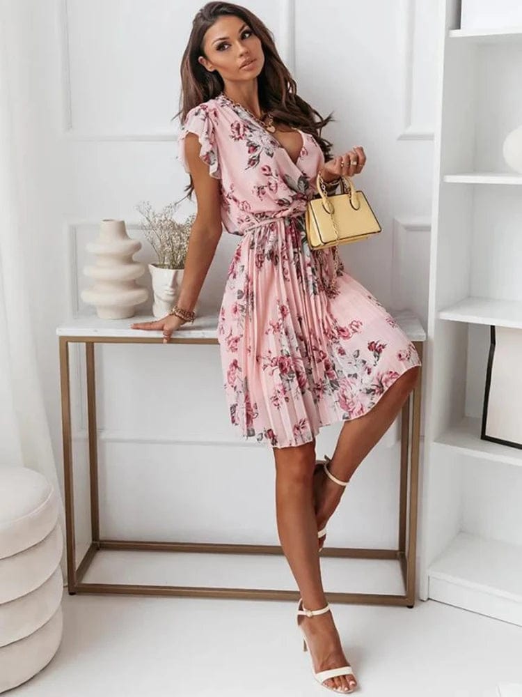 Floral chic meets summery ease in our breezy floral dress!
