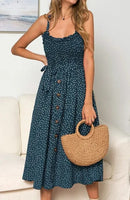 Summer dress with polka dot straps with a bow tie without straps and a loose bandage