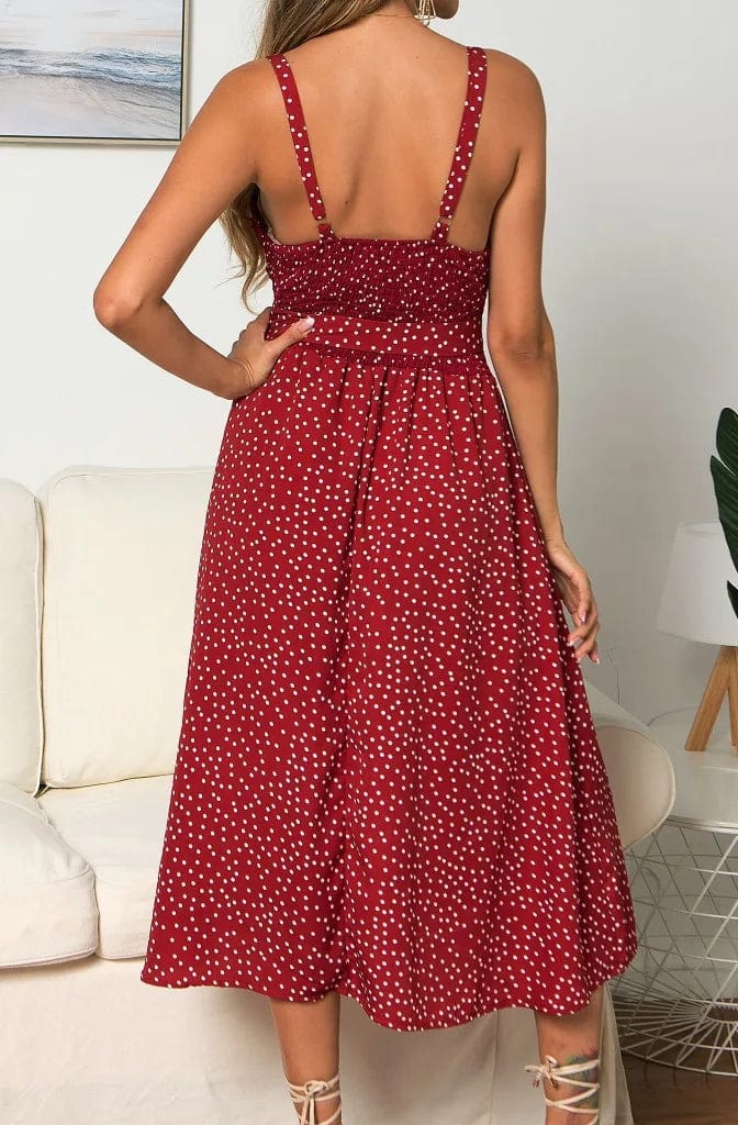 Summer dress with polka dot straps with a bow tie without straps and a loose bandage